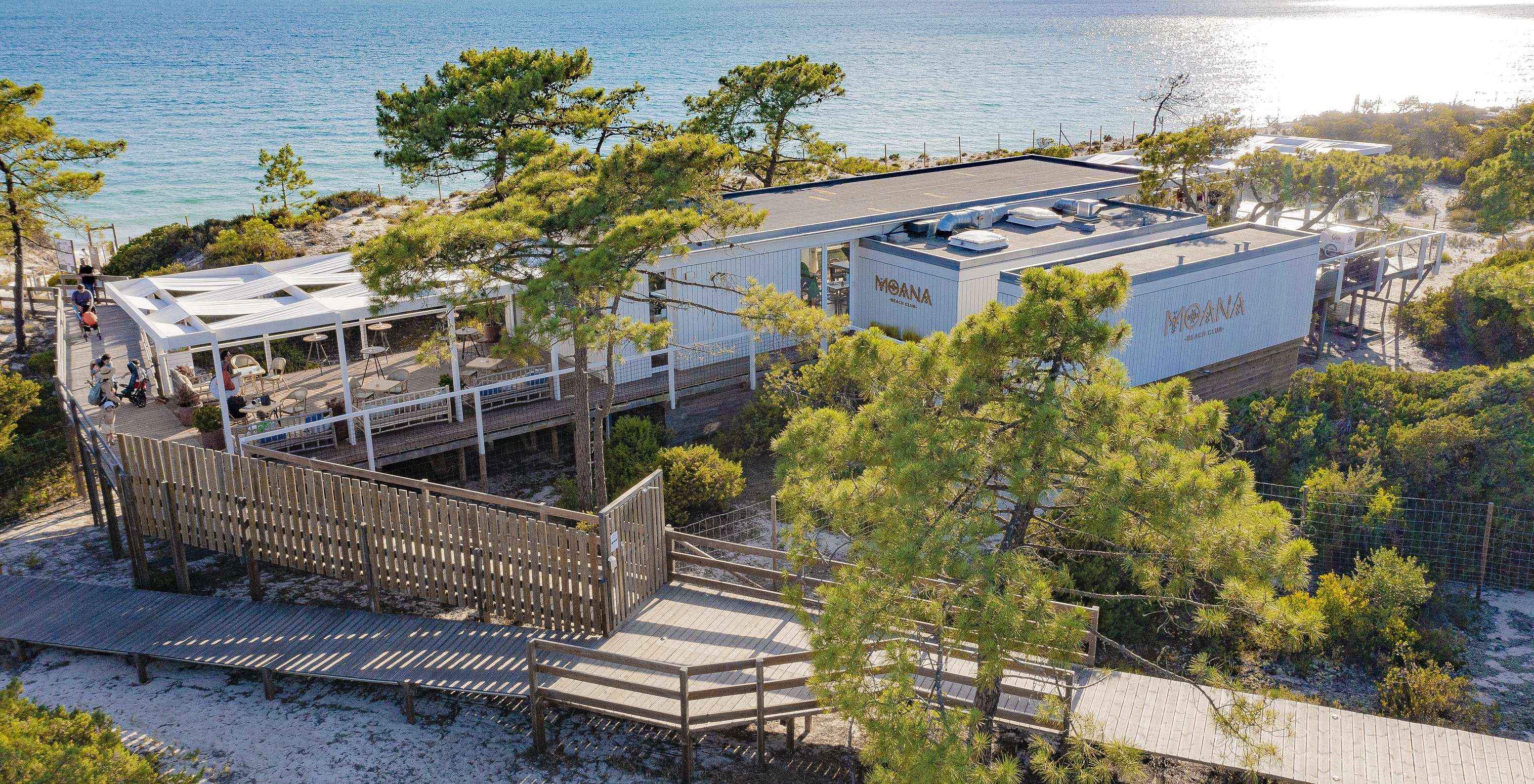 Aerial view of Moana Beach Club, the beach bar at Pestana Tróia Eco Resort, with a terrace and sea view