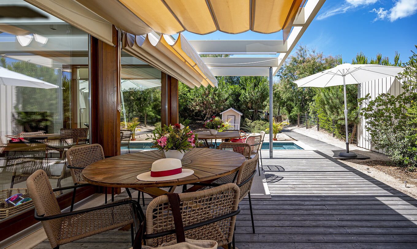 The Aqua Villa of Pestana Tróia Eco Resort has a terrace with tables and chairs where you can relax