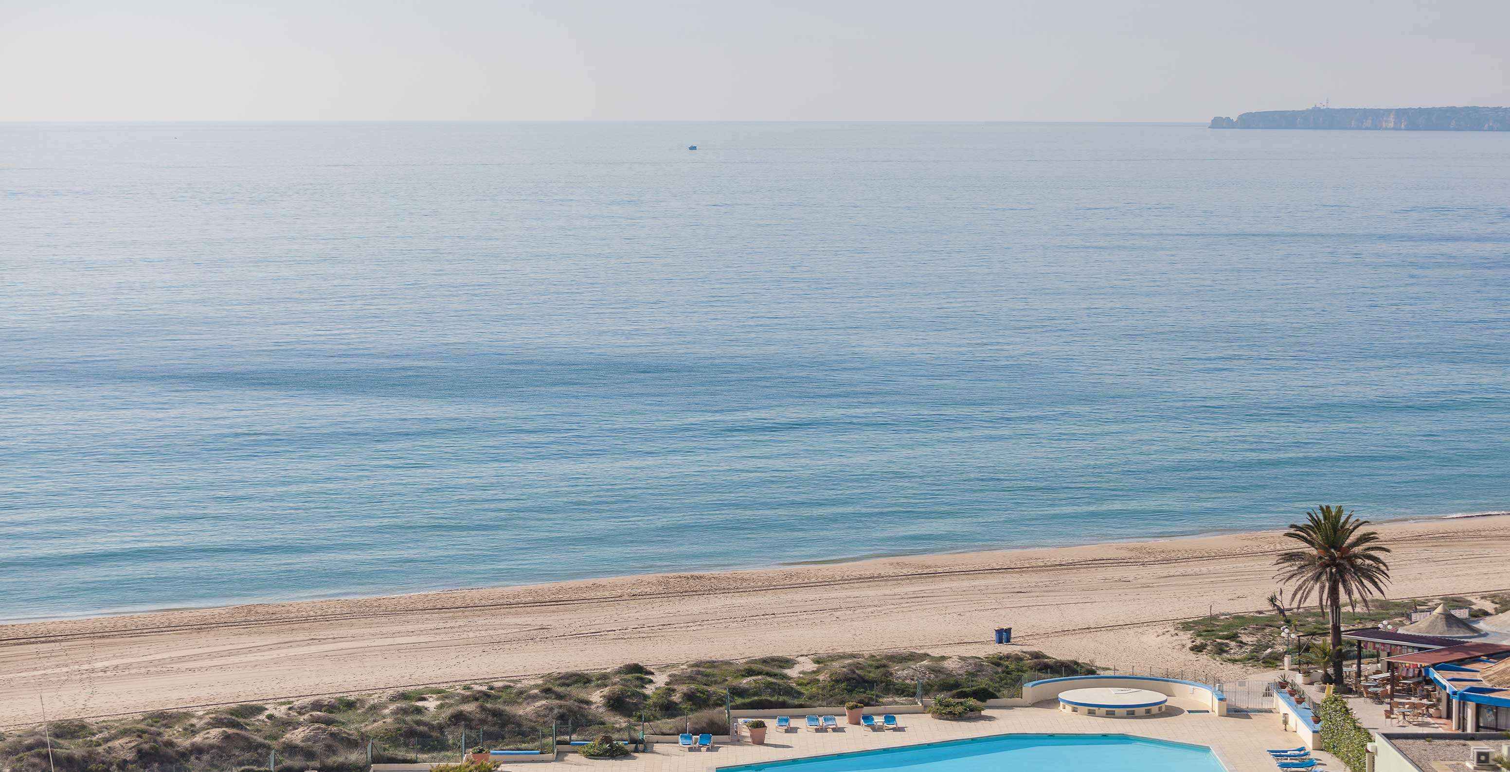 From the T1 Sea View Apartment at Pestana Alvor Atlântico, you can see the beach and sea, as well as an outdoor pool