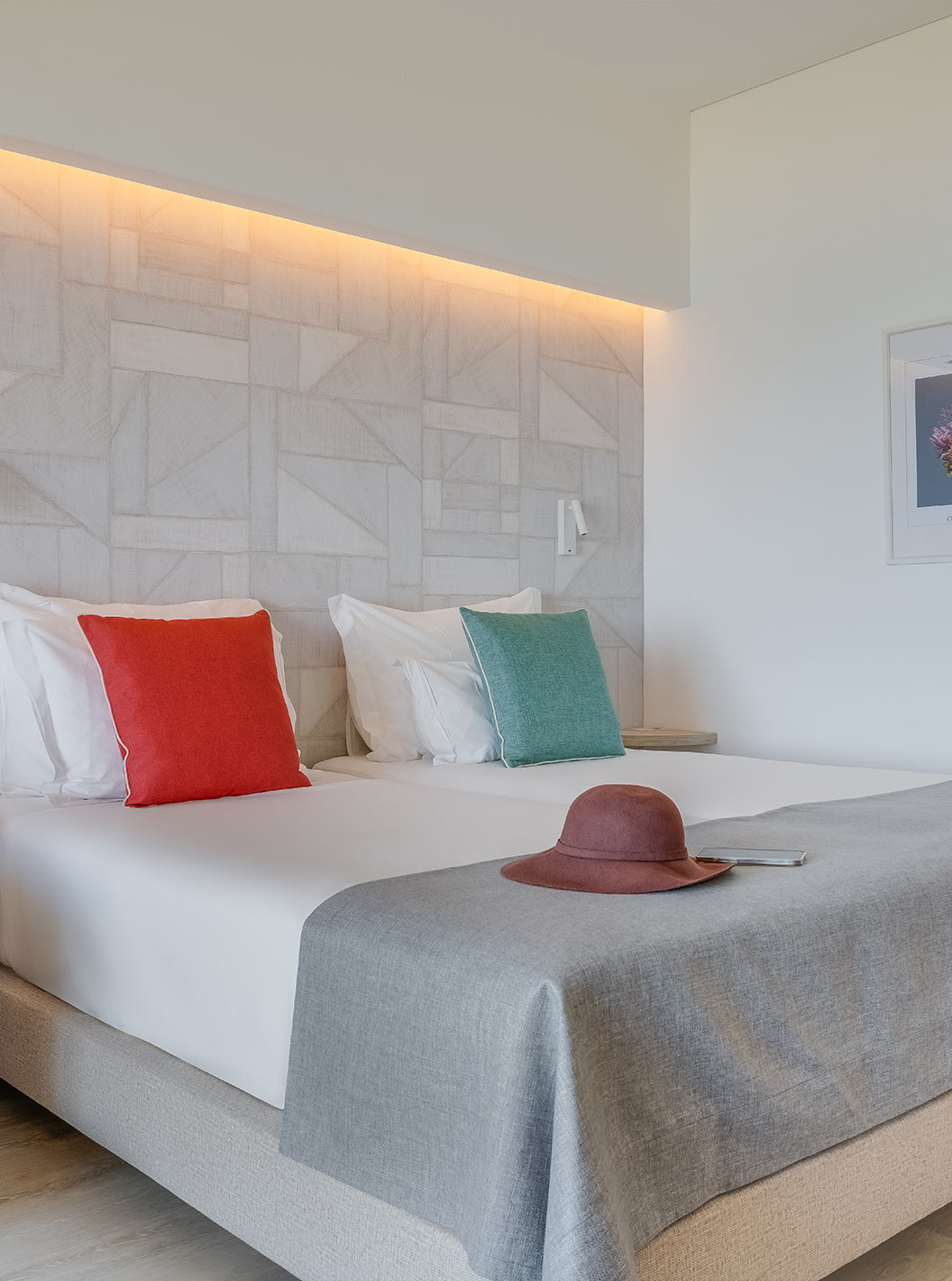 The Family Room at Pestana Blue Alvor Beach has two single beds, a picture, and a large mirror on the wall