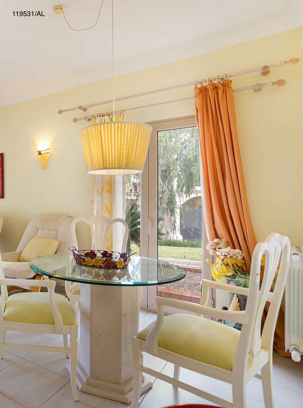 The Pestana Carvoeiro Golf T1 Standard Apartment has a living room with TV, tables, chairs, and an outdoor view