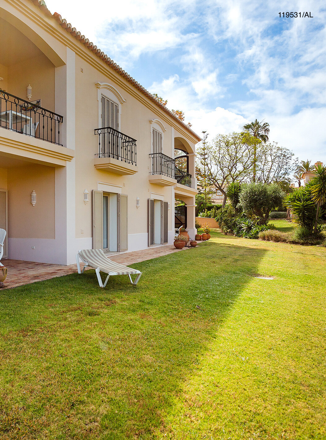 The Pestana Carvoeiro Golf T1 Standard Apartment has an exterior patio with a balcony and grass
