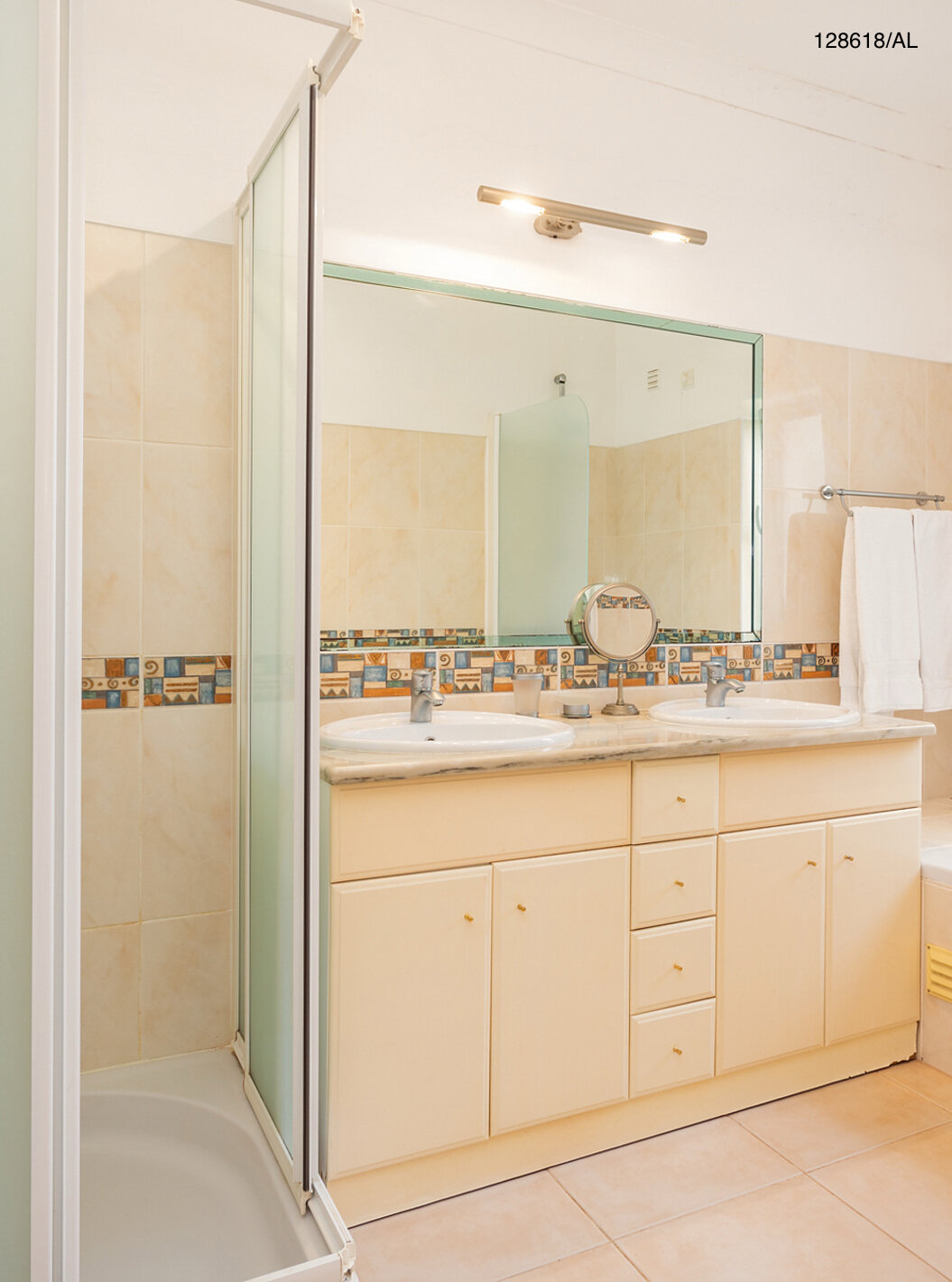 The Pestana Carvoeiro Golf V3 Superior Villa has a bathroom with a bathtub, shower, and sink with a mirror