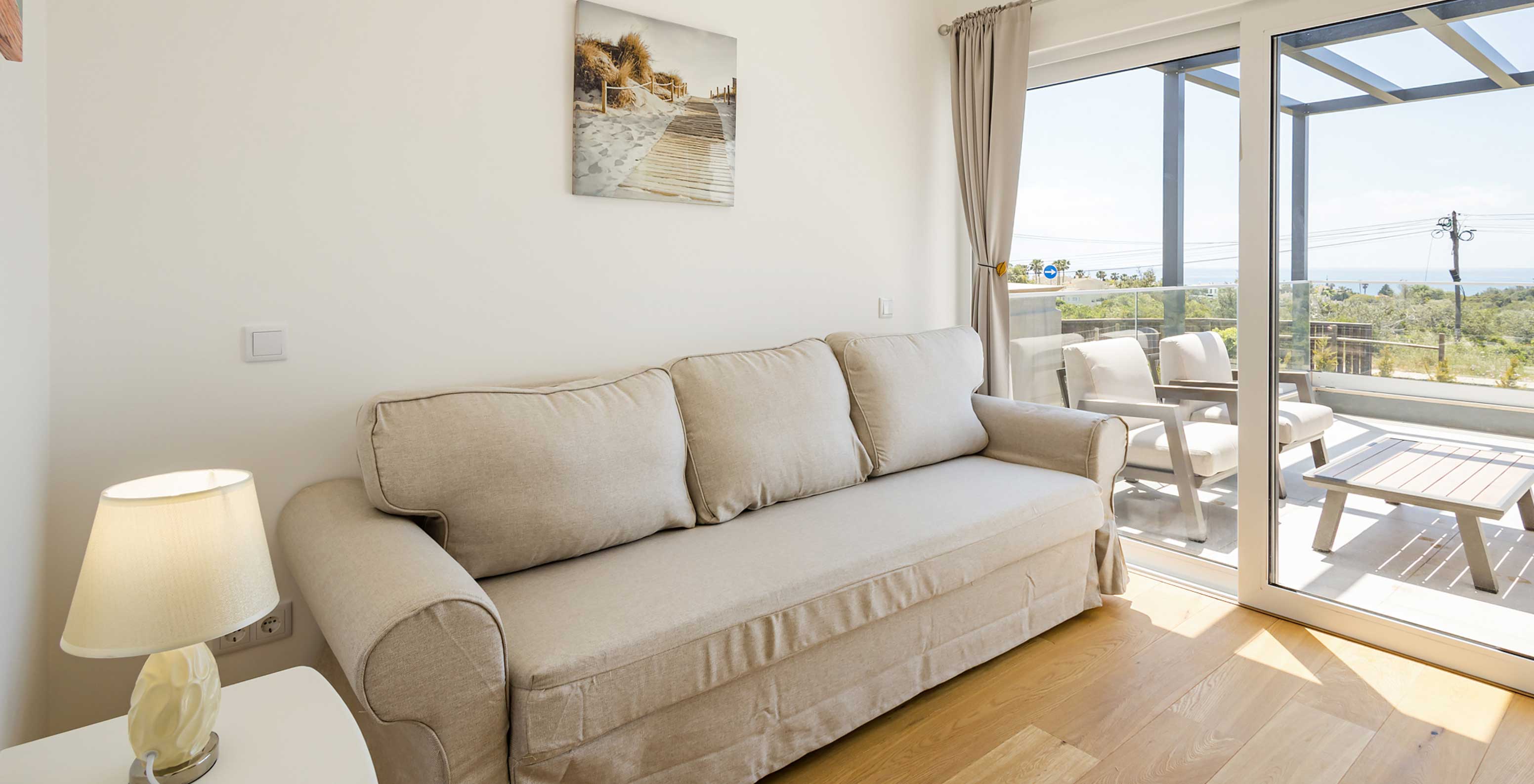 Pestana Valley Nature Village apartment has a sofa and a nature view