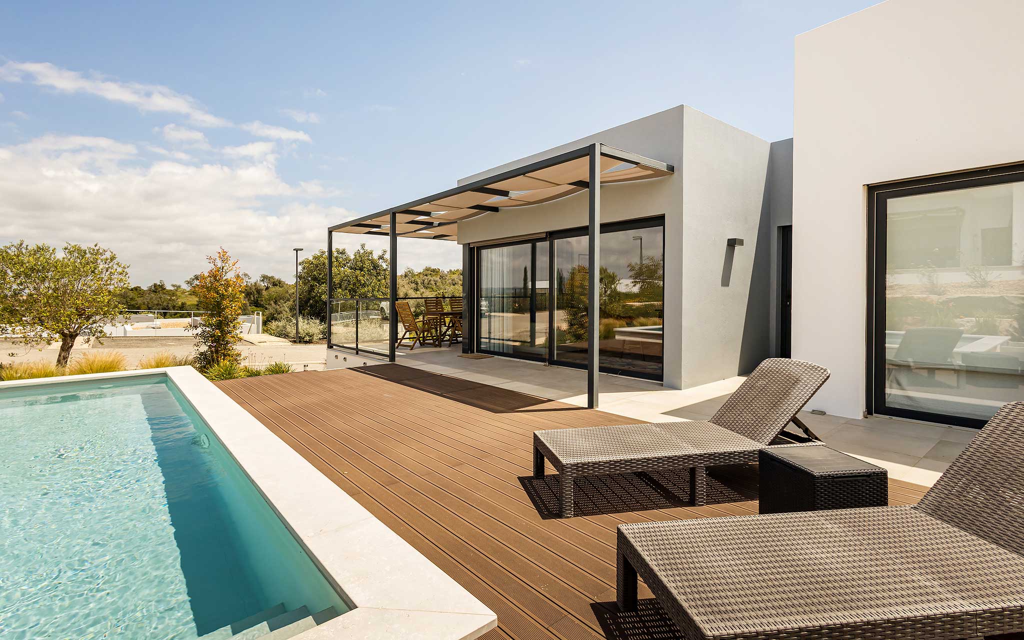 Modern terrace at Pestana Valley Nature Village with Villas in the Algarve, with a pool and natural surroundings