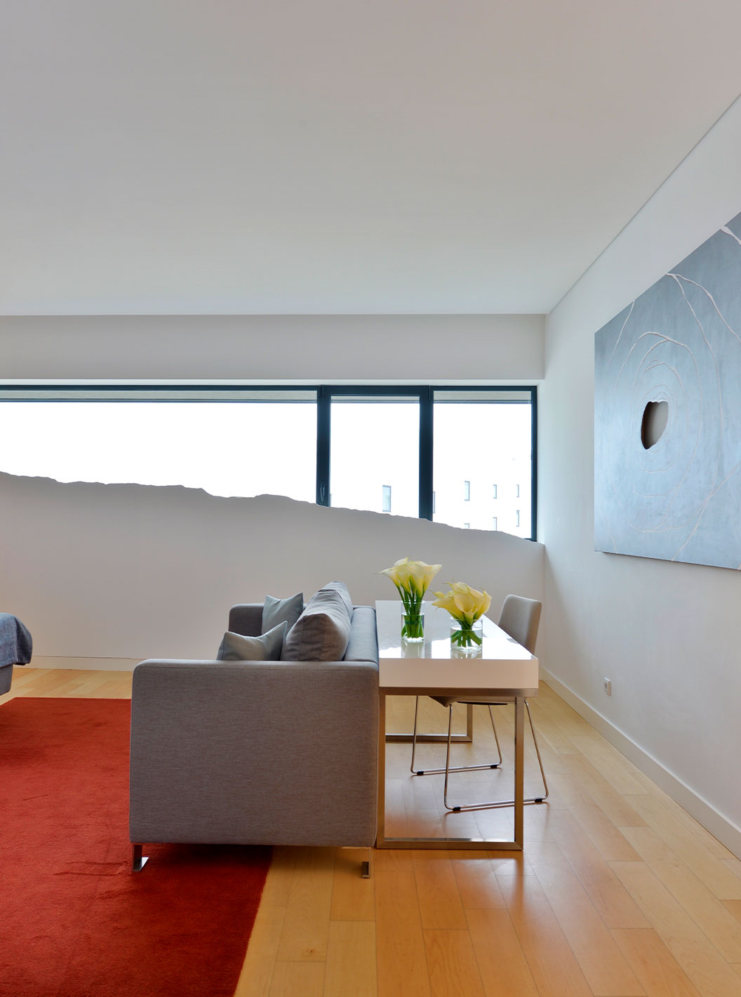 The Superior Double Room at Pestana Cidadela Cascais has a sofa, a desk with a chair, and a window with art