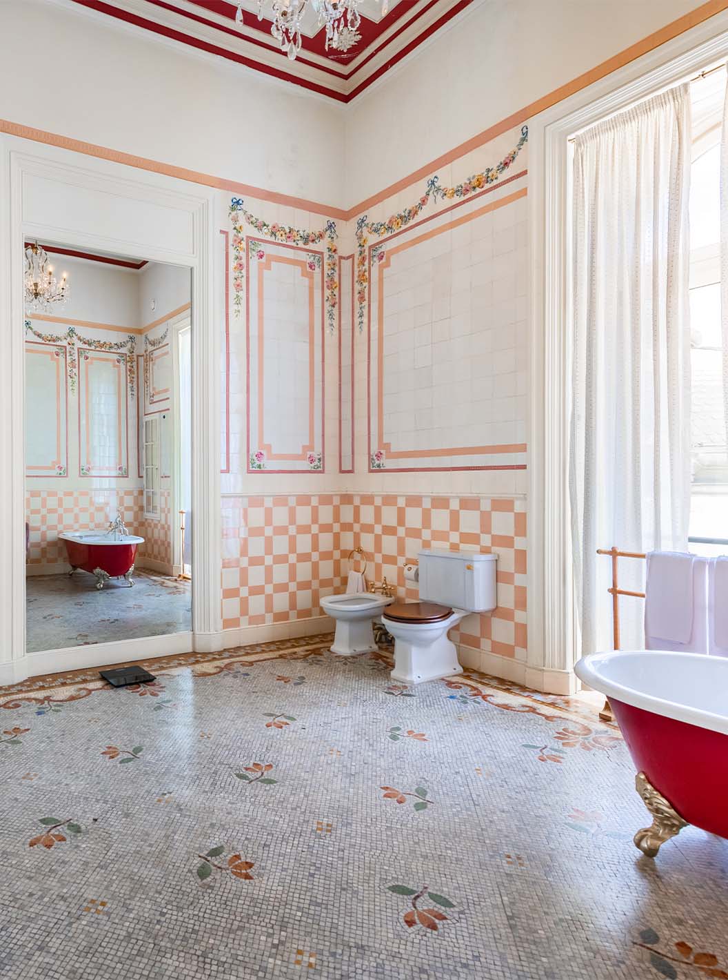 The Suite D. Amélia at Pestana Palace Lisbon features a spacious bathroom with tiles, a window, a bathtub, shower, and mirror