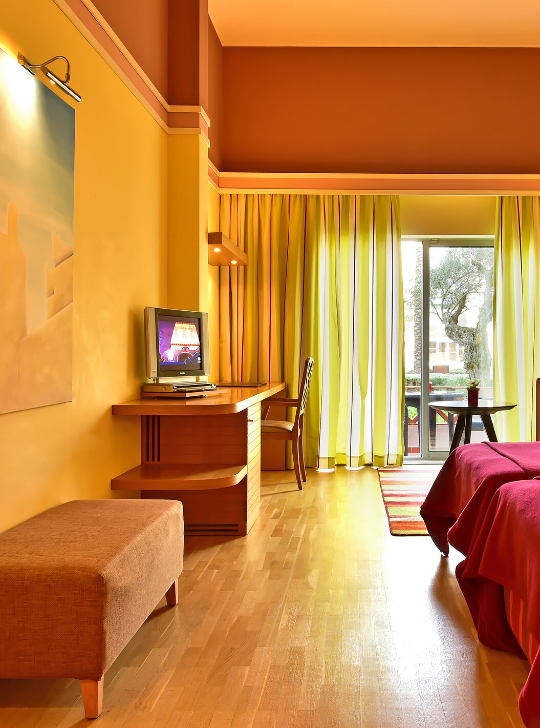 The Superior Double - Pool View of Pestana Sintra Golf has two beds, a picture on the wall, a sofa, and a window