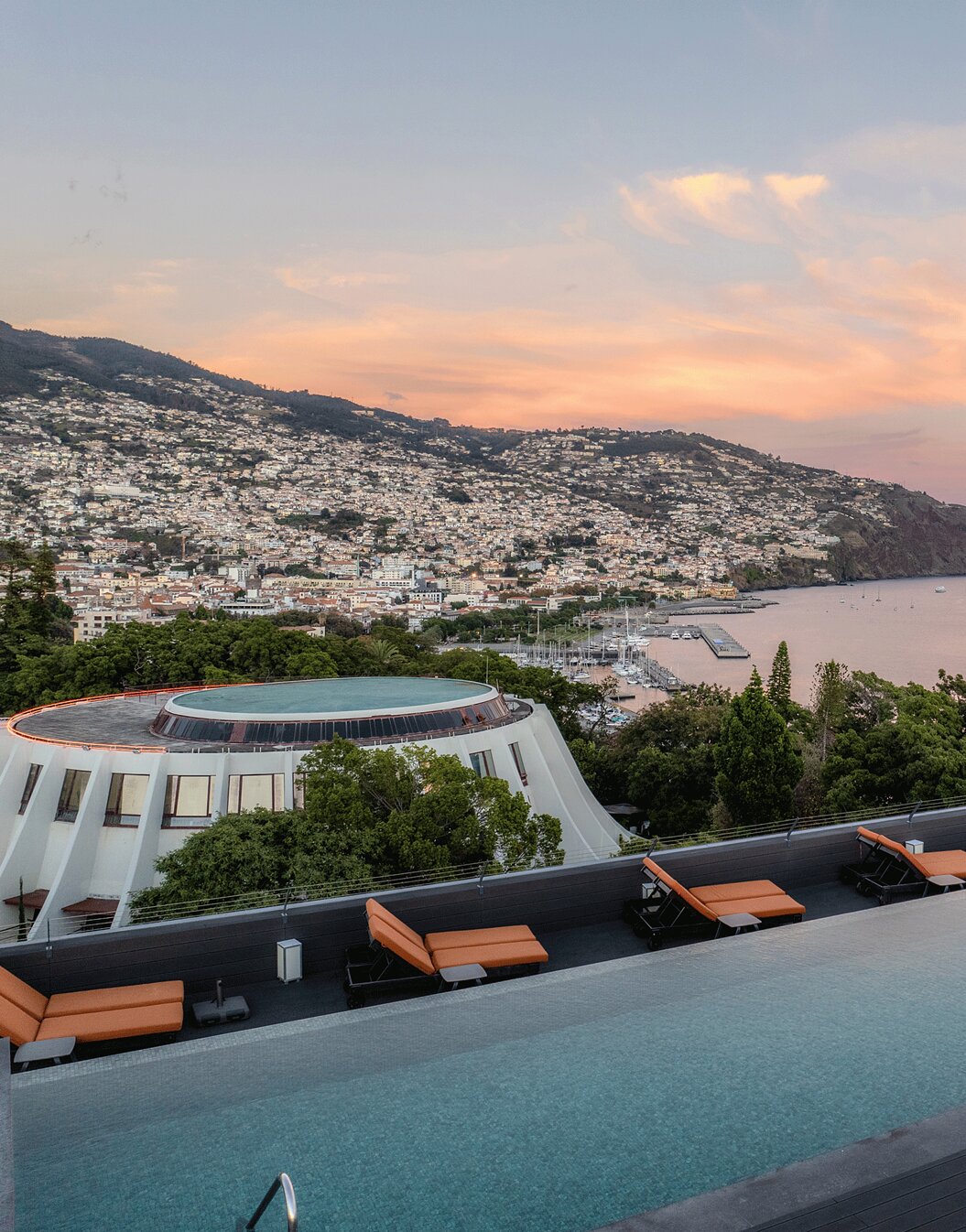 View of the infinity outdoor pool at Pestana Casino Park, a 5-star hotel in the center of Funchal