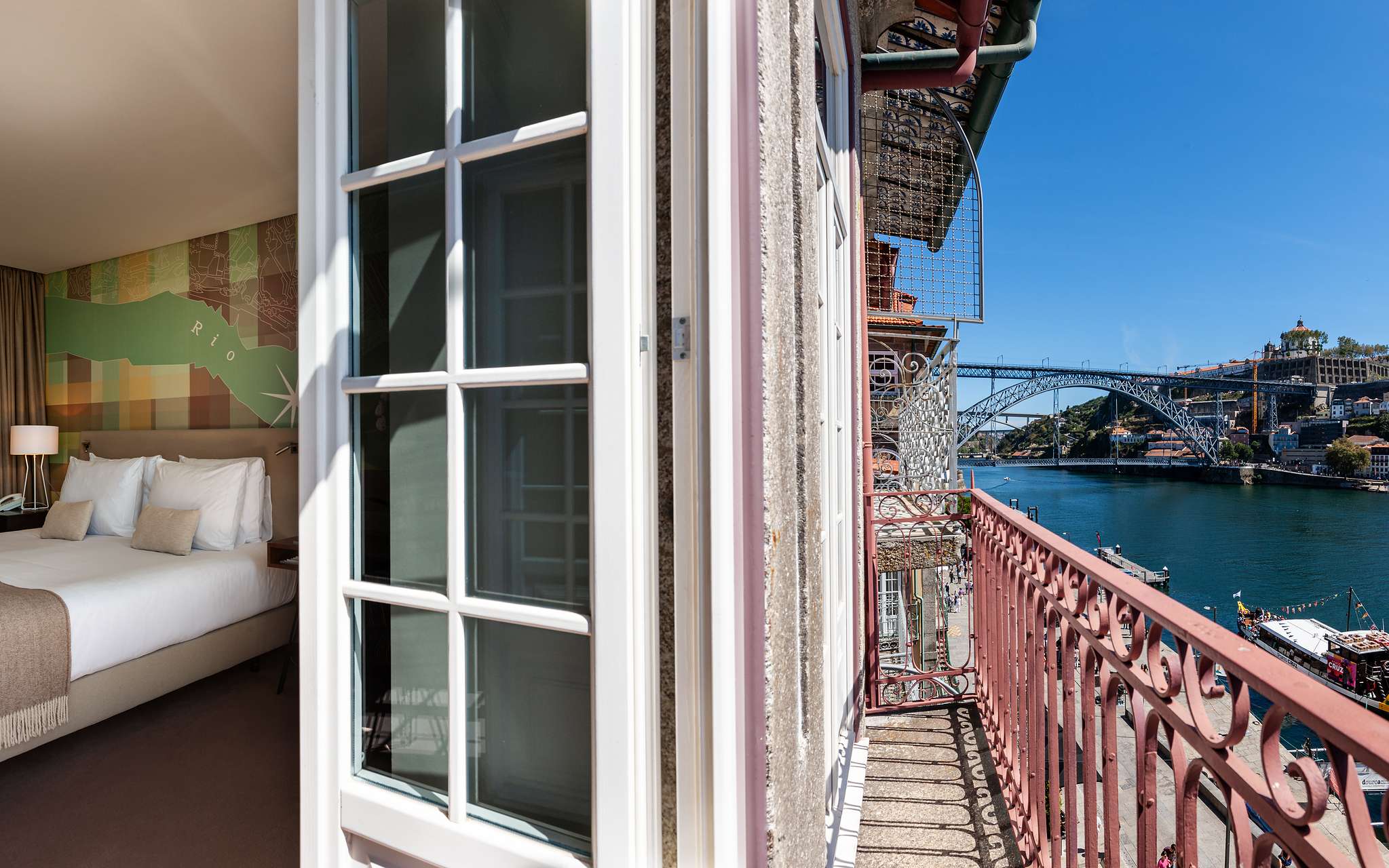 View of the Ribeira and Dom Luís I Bridge from the room of Pestana Vintage Porto, a 5-star hotel in downtown Porto