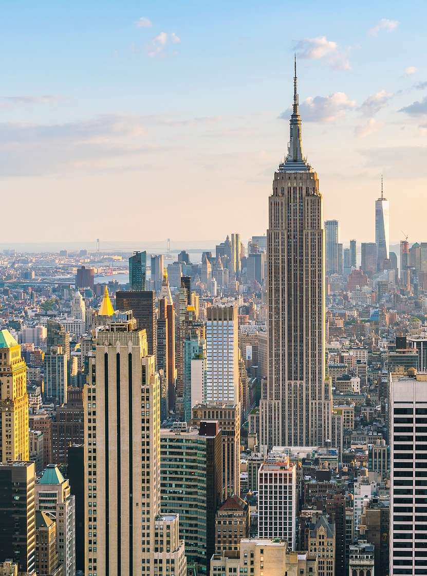 New York skyline with the Empire State Building in the foreground, surrounded by skyscrapers in downtown Manhattan