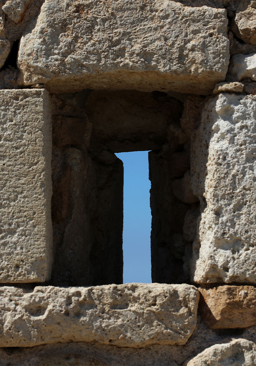 Stones of Sagres Castle in the Algarve revealing a rich and ancient history against the blue sky