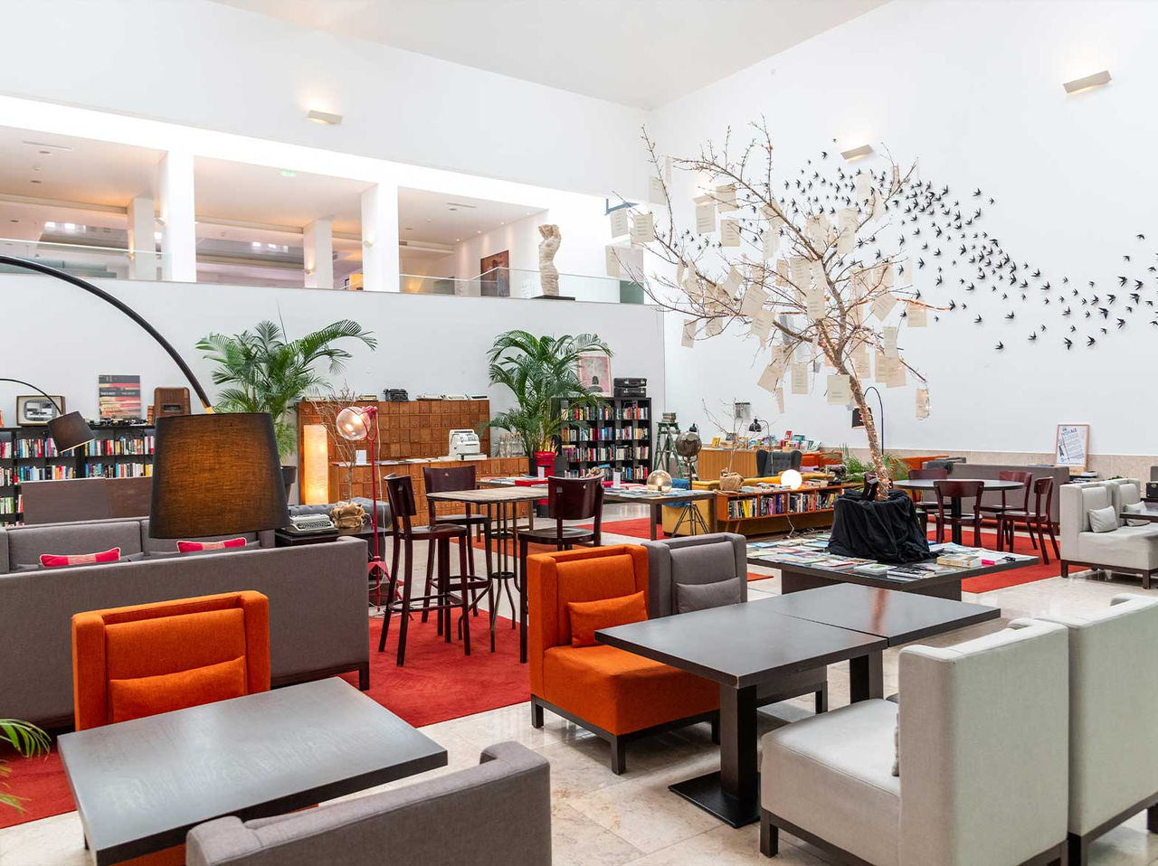 Restaurant The Chapter in a 5-Star Hotel in Cascais, offers drinks amid book-filled shelves