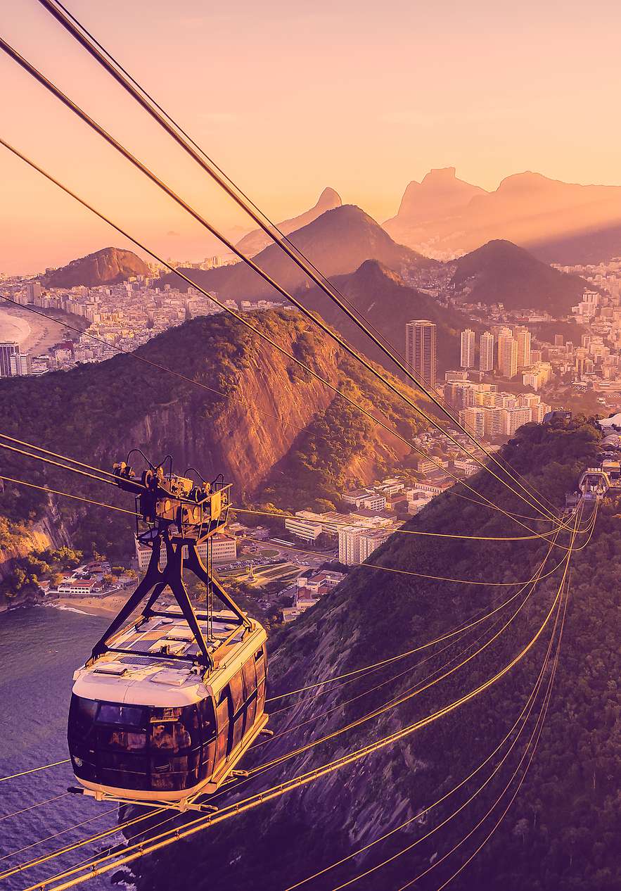 Sugarloaf Cable Car offers a view of the city where mountains sea and buildings can be seen