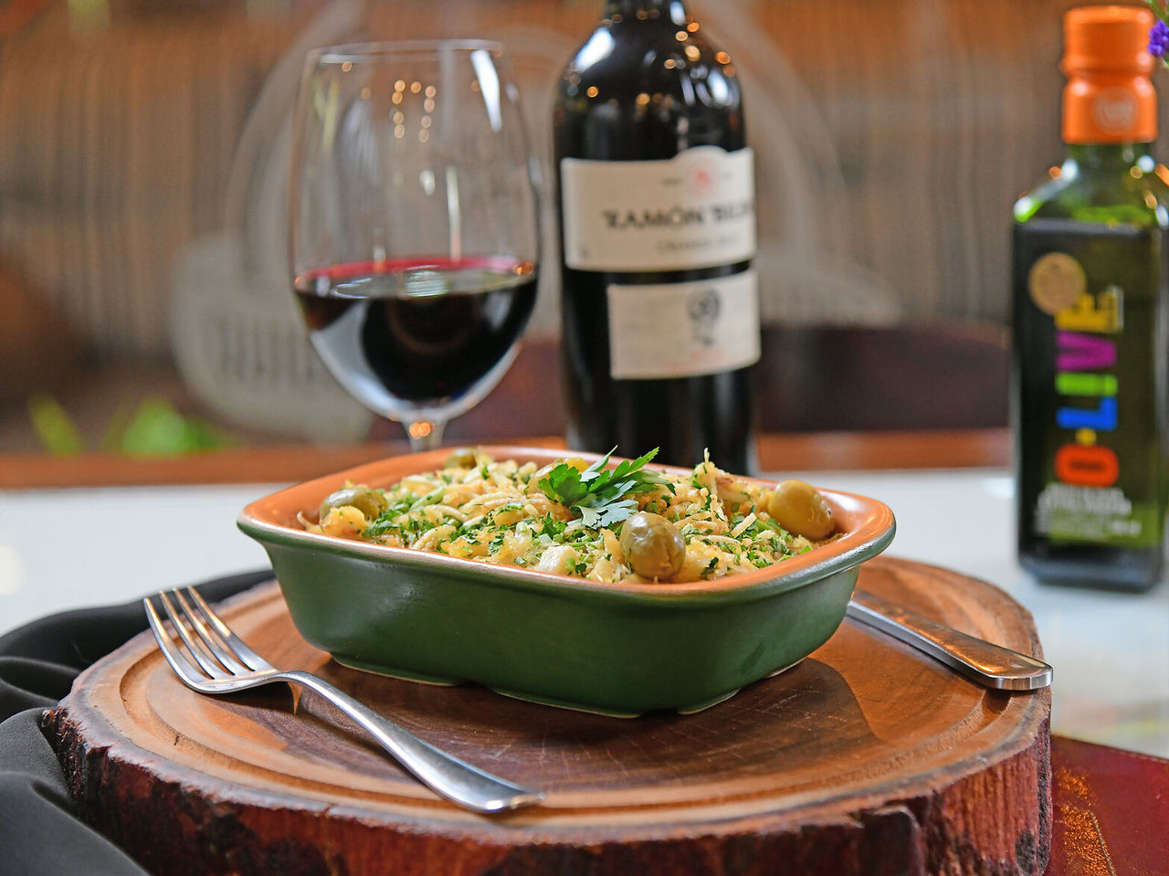 The Cais da Ribeira restaurant, at the Hotel in central São Paulo, serves Portuguese dishes like Bacalhau à Brás with olives